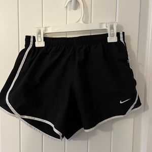 black Nike running shorts